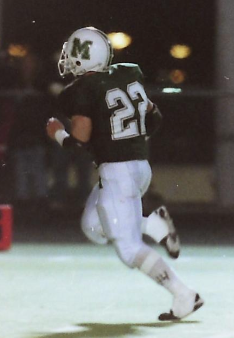 Nick Palazzo (#22) breaking away for Mayfield High School