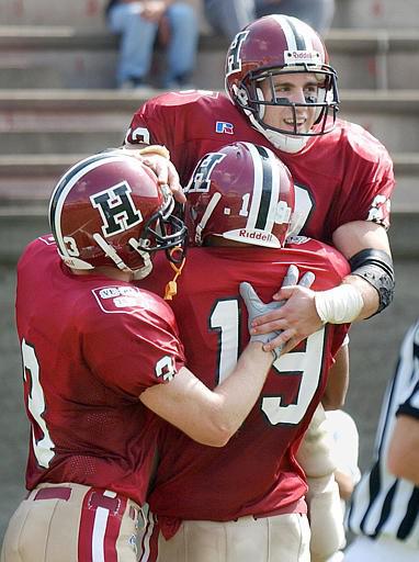 Nick Palazzo scoring a touchdown for Harvard football